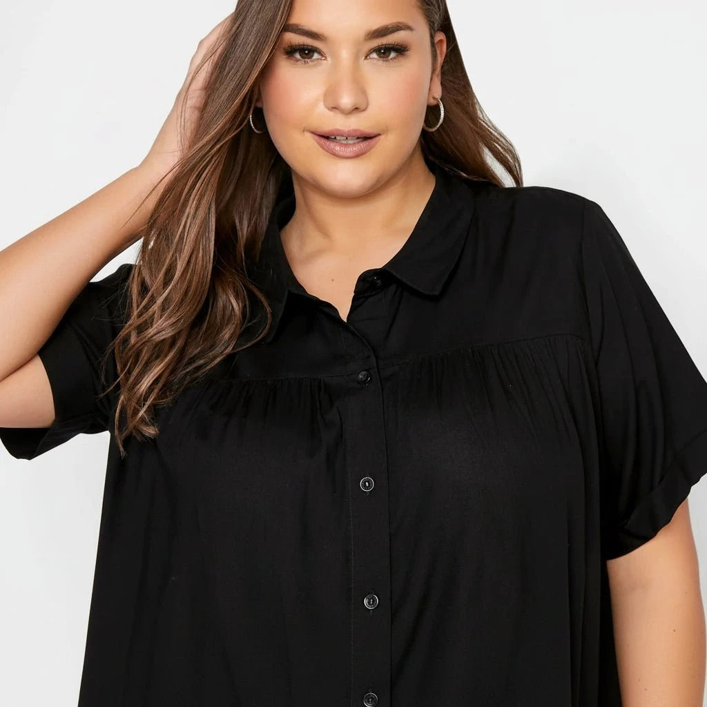 CAMISA LARGA NEGRA CON VOLANTES